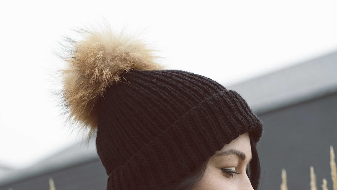 accessoires de tricot comme un pompon pour une tuque de la marque collections m