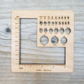Ruler for measuring a sample and a gauge